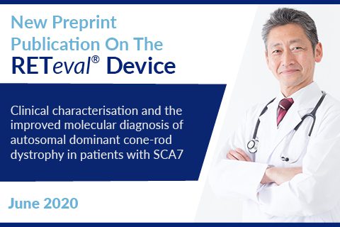 Male Asian doctor in white lab coat smiling